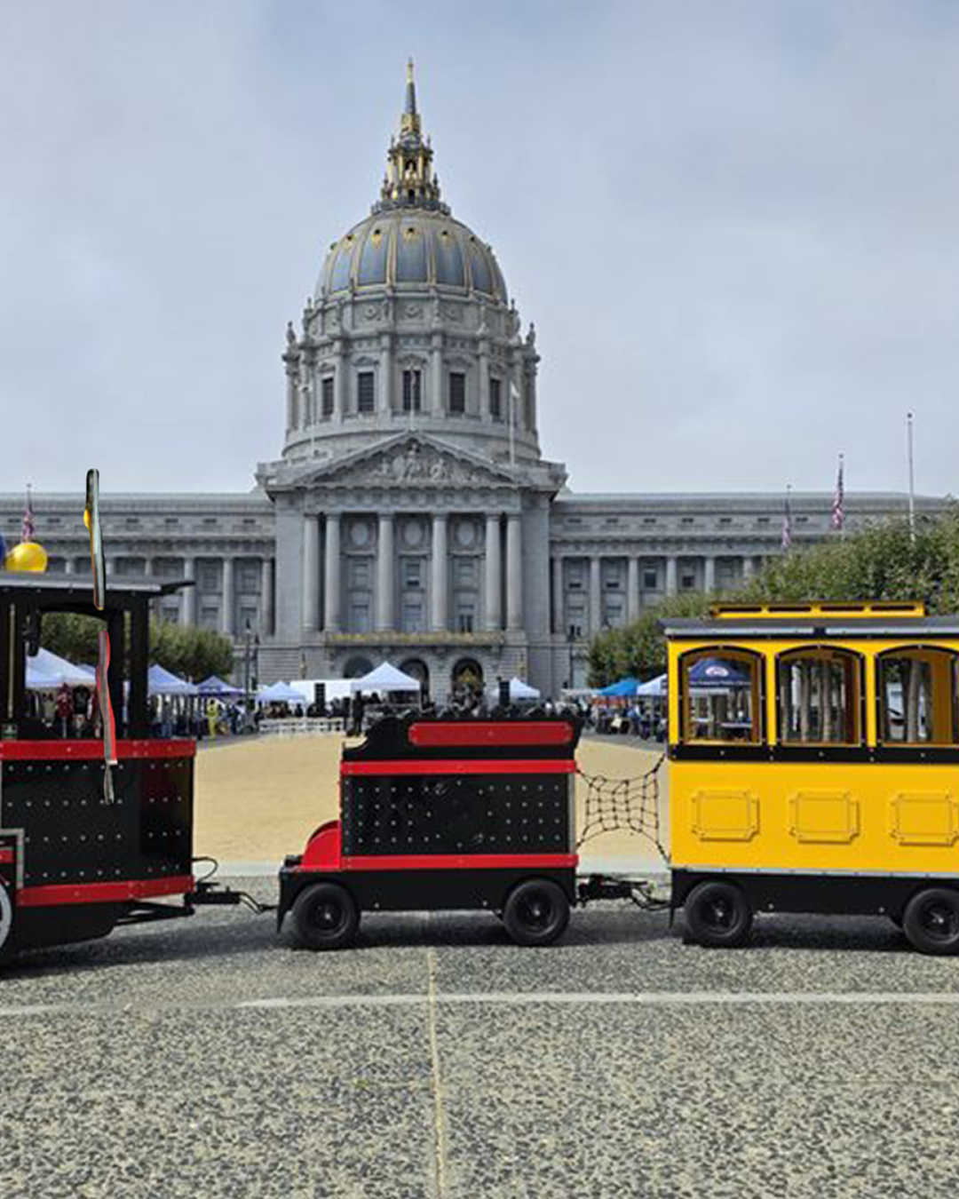 Wattman Mini Express trackless train at Civic Center Plaza San Francisco demonstrating compact commercial quality