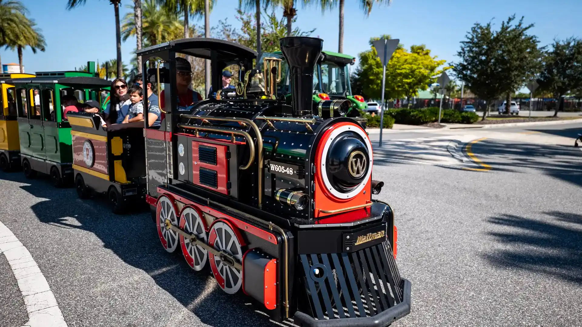 Wattman Mini Express electric trackless train in operation at a U.S. venue, Assured Value Program 48-month warranty coverage